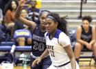 Cove sophomore Oni Boodoo drives the lane against Shoemaker’s Zaiah Jackson during the Lady Dawgs’ 47-44 loss to the Lady Wolves Tuesday at Bulldawg Gymnasium. Boodoo led the Lady Dawgs with 12 points and four assists.