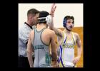 CCLP/TJ MAXWELL Copperas Cove senior Lane Teeter has his hand raised after winning his thirdstraight district championship during the District 13-6A werstling meet held Saturday at Shoemaker High School.