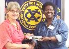 Courtesy Photo - Noon Exchange Club of Copperas Cove President Inez Faison presents Brenda Titus a gift for her presentation about Hope Pregnancy Center during the September 16 meeting.