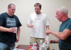 CCLP/DAVID J. HARDIN - Derek Chase, Matthew Shelley, and Stephen Bennett sample almonds and drink Bai antioxidant infusion drinks during the men’s health improvement class last Thursday night at GymKix.