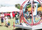 CCLP/BRITTANY FHOLER - One of the attractions at the 3rd Annual Holy Family Fall Fest was the Spaceball Gyroscope.