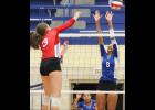 CCLP/TJ MAXWELL - Midway senior Allye Beth Deaton hits against Copperas Cove sophomore Aidan Chace during their match Friday in Waco. No. 1 state-ranked Midway (29-2, 5-0) swept the Lady Dawgs (23-12, 3-1) by a score of 25-5, 25-10, 25-7 to remain undefeated in District 8-6A action.