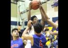 CCLP/TJ MAXWELL - Coperas Cove’s Quinton Ford shoots in traffic against Midway last year as a freshman. Ford is expected to make an impact as a sophomore for the 2016-2017 version of the Copperas Cove Bulldawgs.