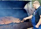CCLP/FILE PHOTO - Grilled sausage was in high demand at Saturday’s Sausagefest held by Trinity Lutheran Church.
