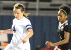 CCLP/LEE LETZER - Cove senior Ali McBride dribbles down field in front of Harker Heights defender Sierra Dickey during their District 12-6A contest Tuesday at Bulldawg Stadium. McBride scored Cove’s lone goal in the 1-0 shutout