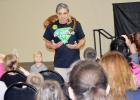 CCLP/BRITTANY FHOLER - Robert Trejo with Zoomagination talks about the kinkajou on his shoulders during Saturday’s 7th annual Eco Harvest festival.