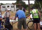 CCLP/PAMELA GRANT - Cyclists riding in the annual Cove House Classic Bike Tour take a break at the first rest stop at the Topsey Church.