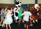 FILE PHOTO - Children and families gathered at a past National Dance Day to kick up their feet and learn some dance routines at GymKix.