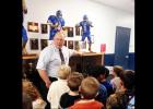 COURTESY PHOTO - CCISD Athletic Director Jack Welch greets second grade gifted education students and takes them through the hall of fame in the athletic annex. Students were visiting with athletic trainers to learn about the importance of movement to their overall health.