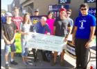 Courtesy Photo - The Copperas Cove High School Excel Club along with the HUTS Excel Club collected more than 1,200 pounds of non-perishable food items and $700 in donations at Wal-Mart on Saturday as part of the two clubs’ Make A Difference Day service project.