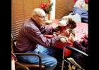 CCLP/PAMELA GRANT - Nursing home residents enjoy their Christmas gifts donated by the community of Copperas Cove.