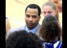 CCLP/TJ MAXWELL - Cove girls’ head basketball coach Eldridge McAdams talks to his team during district play last year. McAdams earned his 200th career win in the season opener against Leander.