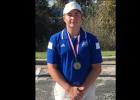 Courtesy photo - Cove senior Caden McAnally poses with his 1stplace medal after shooting a 77 to win the Killeen ISD Invitational on Thrsday.