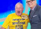 Courtesy Photo/CBS - Manfred Zimmer of Copperas Cove stands on stage with Price Is Right host Drew Carey during a recording of the show. Zimmer went on to win the overall showcase prize worth more than $40,000.