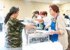 CCLP/BRITTANY FHOLER - A Sausage Fest-goer points out her sausage selection at the Trinity Lutheran Church’s Annual German Sausage Fest held Saturday at the Copperas Cove Civic Center.