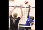 CCLP/TJ MAXWELL - Copperas Cove senior Chyanne Chapman hits against Vandegrift senior Effie Zielinski during their match on Tuesday. The Lady Dawgs are 2-2 on the season after the first two contests of the Austin Varsity tournament.