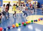 Courtesy Photo/CCISD - Clements/Parsons Elementary students rush to the center court line to grab a ball and attempt to knock out a school administrator in a friendly game of dodge ball. The school offered the opportunity to all students who had perfect attendance for the first six weeks.