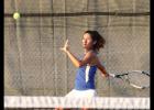 CCLP/TJ MAXWELL - Copperas Cove’s Ashley Martinez reaches back for a forehand during a District 8-5A match against Harker Heights. Martinez helped the Dawgs defeat Shoemaker 14-5 on Tuesday with a 6-0, 6-0 shutout in her singles’ match.