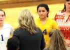 CCLP/TJ MAXWELL - Cove head coach Cari Lowery talks to her team during a time out of their sweep of Harker Heights on Tuesday.