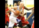 CCLP/TJ MAXWELL - Cove senior Wyatt Behara drives through the lane against Belton. Behara finished with eight points and eight rebounds for the Dawgs.