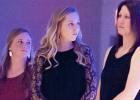 CCLP/TJ MAXWELL - Cove seniors Bailey French, from left, Katy Ranes, and assistant coach Kristy Thompson look on as head coach Cari Lowery speaks during the annual banquet on Wednesday.