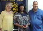 Courtesy Photo - During the Noon Exchange Club of Copperas Cove Aug. 12 meeting, Club Member Pat Thomas awards Karen and Jerome McCaskill the Senior Citizens of the Quarter Award. The McCaskills received the award for their devotion and volunteerism.