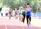 CCLP/TJ MAXWELL ABOVE: Copperas Cove senior Amber Boyd (2:17.76) finishes first in front of Desoto senior Monica Carroll (2:18.41) to earn her first of three Region I-6A berths. Boyd also finished second in the 1,600m run (5:14.05) and fourth in the 4x400m relay (3:58.70) with teammates freshman Anayah Copeland, senior Imari Neal and junior Talia Kinslow. BELOW LEFT: Cove senior Josh Canete competes in the high jump where he set a new personal best mark of 6-feet, 9-inches to win gold. BELOW RIGHT: Cove sen