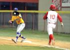 CCLP/TJ MAXWELL Copperas Cove senior first baseman Tyler Ingram makes a putout of Belton’s Peyton Vybiral during the fifth inning of the District 8-6A contest between the Bulldawgs and the Tigers. The two teams will face off for a chance at the final playoff spot tonight in Cove.