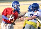 CCLP/TJ MAXWELL - Cove junior quarterback Jaylen Smith runs through the middle on a quarterback keeper during practice on Wednesday. Smith is expected to take of the majority of snaps at quarterback with last year’s starter Caine Garner expected to expand his role to receiver.