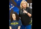 CCLP/DAVID MORRIS - Copperas Cove head volleyball coach Cari Lowery talks about Kianna Childers during the afternoon signing ceremony Wednesday at the school.