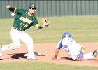 CCLP/TJ MAXWELL - Cove senior Micjhael Hays slides into second base under as Academy shortstop Max Lopez reaches for the throw during the title game of the Cove Tournament on Saturday.