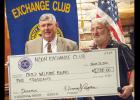 CCLP/DAVID MORRIS - Noon Exchange Club President Dennis Ayres, right, presents Judge John Firth a check for the Coryell County Child Welfare Board.