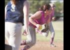 CCLP/DAVID MORRIS - Rachel Morris of the 15-and-under Cove Chaos makes a play on the ball during the 15U District Softball Tournament in McGregor on Wednesday.