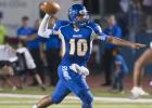 Copperas Cove quarterback Manny Harris throws on the run during the Bulldawgs’ 35-20 homecoming win over the Killeen Kangaroos on Friday. Harris returned after missing three games with a knee injury.