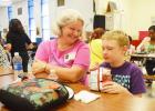 Nellie Twilleager enjoys spending time with her grandson, Eric Heriford, at Friday’s
Grandparents Day Lunch at Halstead Elementary.