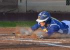 Kyle Winstead makes the slide into home plate adding a run early in the game against the Killeen Roos