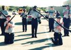 The Cove High JROTC Armed Drill Team puts in some last-minute practice time before Saturday’s competition in Fort Worth.