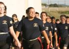 Cadets march around the high school campus during their organizational day.