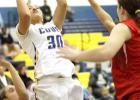 Cove senior Mikayla Blount shoots in traffic during their 51-42 win over Belton. The Lady Dawgs sit alone in third place at 5-3.