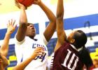 Copperas Cove sophomore Chyanne Chapman shoots over Killeen sophomore Shianne Johnson during their District 12-6A contest on Friday. The Lady Dawgs fell to the Lady Roos 56-50 after leading 40-31 mid-way through the third quarter.