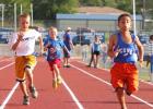 Daniel Izquierdo, 8, second from right, finishes ahead of the pack in the 8-under 50-meter Dash during the Copperas Cove Summer Track opening meet on Monday at Bulldawg Stadium. Izquierdo also finished firstin the 200-meter dash, 3200-meter run, and long jump. 