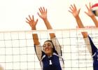 Copperas Cove senior Mikayla Blount, (1) and junior Megan Diaz attempt to block the attack of Ellison’s Ansia Espada during the Lady Dawgs 3-0 (25-9, 25-20, 25-18) sweep of Ellison in their District 12-6A opener Tuesday in Killeen.