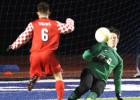 Cove goalkeeper Erik Frazer makes one of 14 saves made during the Bulldawgs’ 7-1 loss to Belton Tuesday at Bulldawg Stadium.