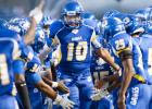 Copperas Cove senior quarterback Manny Harris runs out on the field to awaiting teammates and a rousing ovation by Bulldawg fans prior to their 35-20 homecoming victory over the Killeen Kangaroos Friday at Bulldawg Stadium. Cove travels to Belton tonight to take on the Tigers.