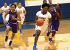 Copperas Cove’s Caprica Brooks takes off on a fast break against Waco University
last Monday. The Lady Dawgs will get back in action tonight at Waco High. The Dawgs will also get back to hoops action with a home contest against Austin
Westlake. 