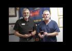 Gary Kafer, left and J.D. Sheffield hold their Morning Exchange Club of Copperas Cove coins following Sheffield’s presentation regarding his recent visit to the Mexico/Texas border.