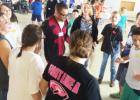 Leo Thompson, 11th grade CCHS Special Education student, leads others in a group dance at the Fall Festival Dance in Lampasas on Thursday.