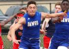 Copperas Cove’s Justin Joe passes the baton to anchor leg Andrew Leuthner on their way to a first place finish in the 4x100-meter relay Saturday at the 2014 Eagle Relays at East View High School in Georgetown. The Bulldawg boys finished in second place with 108 points.