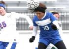 Copperas Cove senior Amanda Arrisola hits a header between two Leander players during the Killeen CenTex Shootout Friday at Leo Buckley Stadium. Cove (3-1) finished in second place.