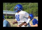 Copperas Cove defensive end Tyrell Thompson runs sprints during practice on Tuesday at the Copperas Cove athletic complex. Thompson hopes his defense will help lead the Bulldawgs to a deep playoff run in 2014-15.